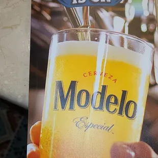 a beer being poured into a glass