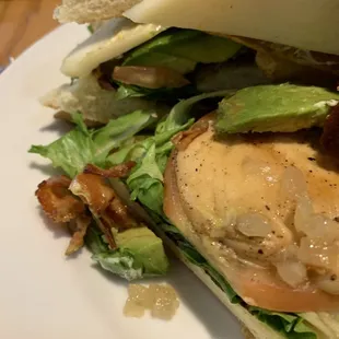 Grilled chicken and bacon sandwich with fries