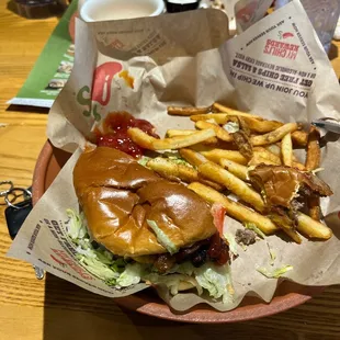 a burger and fries on a plate