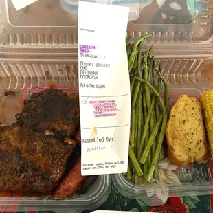 Half Rack of Ribs with corn on the cob, asparagus, and jalapeño sausage.