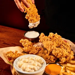 fried chicken and fries with dipping sauce