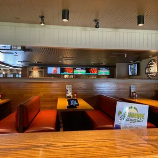 Spacious clean seating and sports bar set up