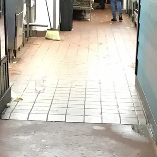 a man and a woman in a kitchen