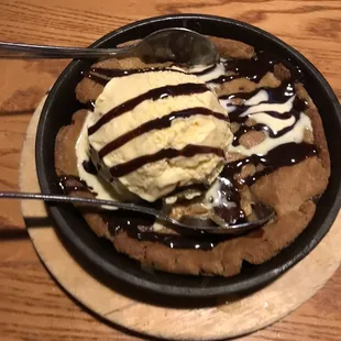 a waffle with ice cream and chocolate sauce