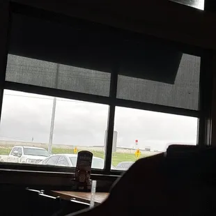 a view of a parking lot through a window