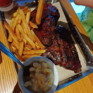Full order of baby back ribs with fries and mac &amp; cheese, $23.29.