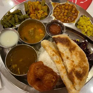 Special Thali: rice, parathas, papad, vada, buttermilk, sambar, rasam, beets, green beans, mixed vegetables, chickpeas, cabbage