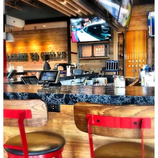 Bar seating is available with multiple large screen TVs.