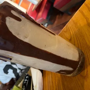 a chocolate covered ice cream sandwich