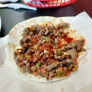 Asada a la Mexican con frijoles taco.
