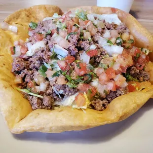 Taco salad - requested only ground beef, lettuce &amp; pico de gallo. Tasty.
