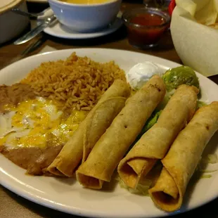 California flautas. Chicken flautas with guacamole, beans and rice. Awesome flavor. The guacamole had the perfect amount garlic.