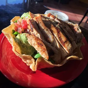 Avocado Chicken Salad: Char-Broiled Chicken Breast, Avocado, Lettuce, Tomatoes, Jack &amp; Cheddar Cheese, Ranch Dressing.