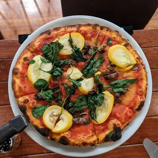 Custom-ordered veggie pizza with no cheese