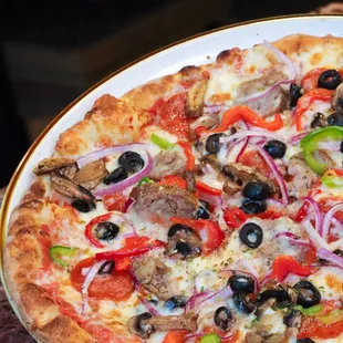 Up close and personal with our pizza supreme. Bell Peppers, onions, olives, mushrooms, sausage &amp; pepperoni.
Best Pizza in Las Vegas