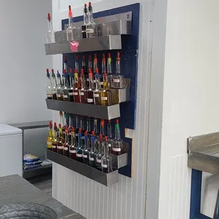 a shelf of bottles
