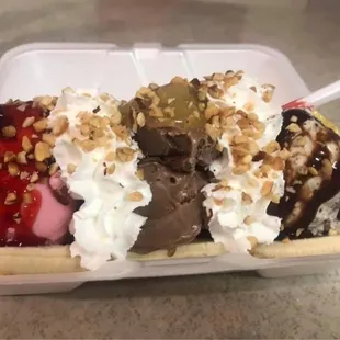 a banana split in a container