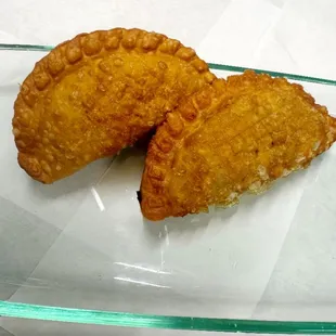 Delicious crispy fried Argentine Empanadas. We have 7 savory and 2 sweet. See our website!