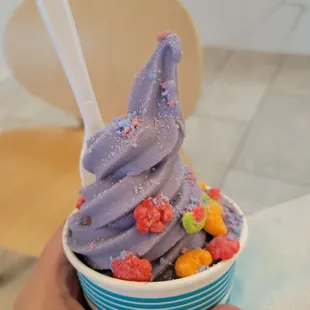 Taro soft serve ice cream with two toppings (trix cereal &amp; cotton candy bits)