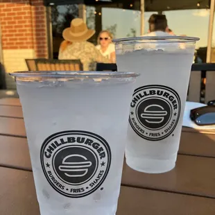 two cups of iced coffee on a table