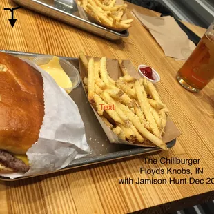 4 oz steak burger with parmesan fries served with their delicious homemade chill sauce. Washing it all down with Truth IPA.