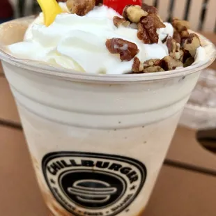 a cup of ice cream and nuts