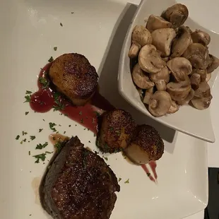 6 oz filet with 3 scallops in a Pinot reduction and sautéed mushrooms
