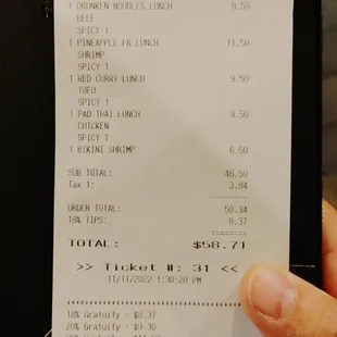 a person holding a receipt