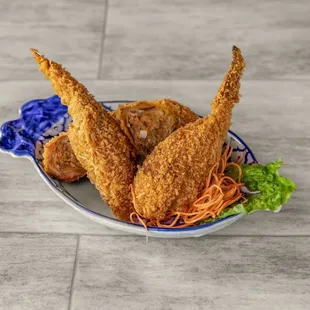 fried chicken and noodles on a plate