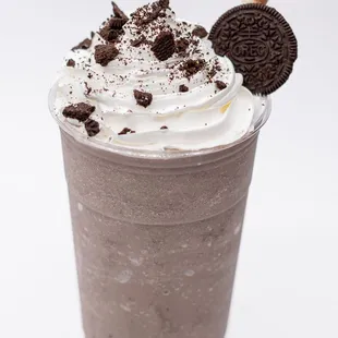 Creamy milkshake blended with chunks of Oreo cookies for a sweet and indulgent treat.