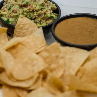 Crispy corn chips served with flavorful guacamole mixed with pico de gallo and roasted salsa. Perfect for sharing and enjoying the vibrant a