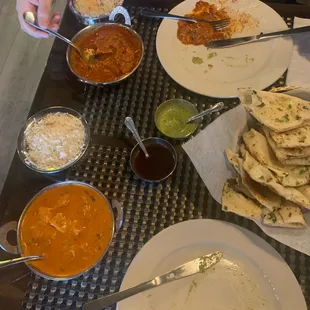 Chicken vindaloo spicy. Butter chicken mild. Comes with rice servings.