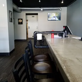 lots of bar seating and more space towards the restrooms