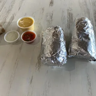 One burrito fixed to our order cut in 1/2 to share