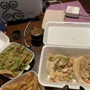 Shrimp tacos plain, corn tortilla, guacamole, French fries