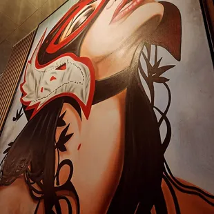 a painting of a woman with a mask on