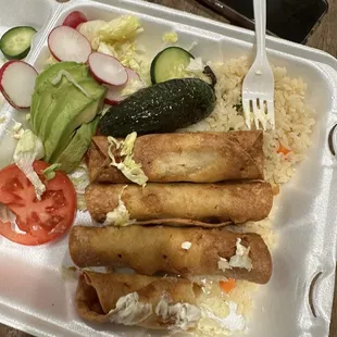 Greasy Flautas that didn't have no any kind of flavor except of the deep fried oil.