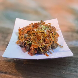 spicy Seasnail salad with Korean Chewy noodle (jjolmyeon)