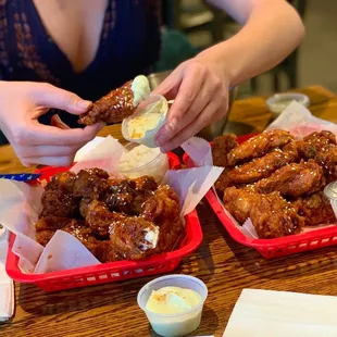 Extra large order of hot king wings with the aioli dipping sauce... pickled radish included...