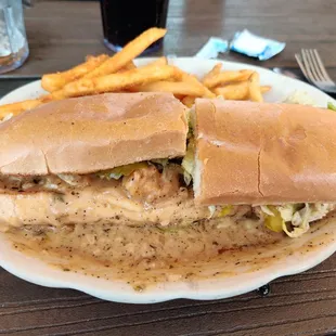 Their reformulated NOLA BBQ shrimp poboy is now a big, soupy mess!