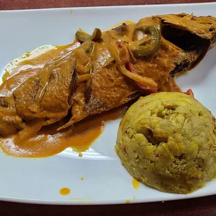 Fried Red Snapper in Coconut sauce, with a side of Mofongo.