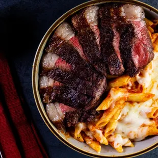 Baked ziti with picahna available in our daily special ask your server for availability.