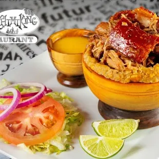 Mofongo filled with roasted pork. Yes thats a crackling pork on top ;)