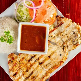 Grilled chicken breast with rice and beans