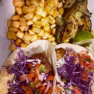 Fish tacos, grilled veggies, potatoes