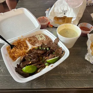 Couldn&apos;t wait to dig in lol... steak fajitas and white queso, chips and salsa :)