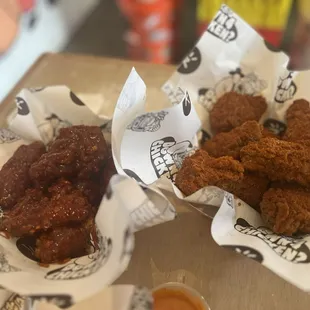 Wings. Get the OMG on the right. You won't even need to know what the other flavor is. Haha!