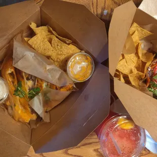 Brisket quesadilla and tacos in munchie boxes
