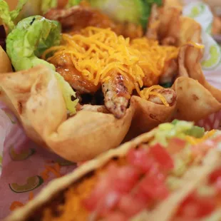 a plate of tacos and chips