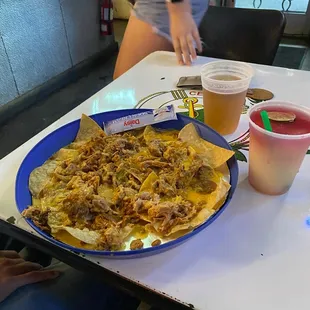 Sangria swirl margarita, draft Modelo, green Chile pork nachos